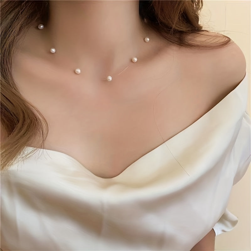 Lunelle | Women's minimalist pearl necklace with invisible thread | White