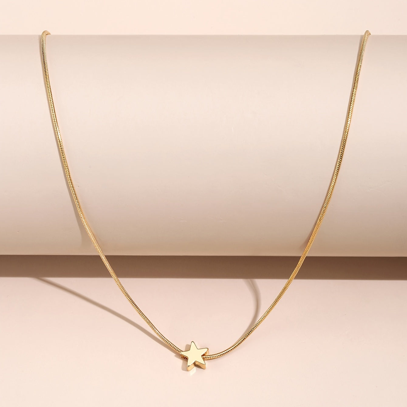 Solmira | Women's heart and star pendant necklace on snake chain | Gold