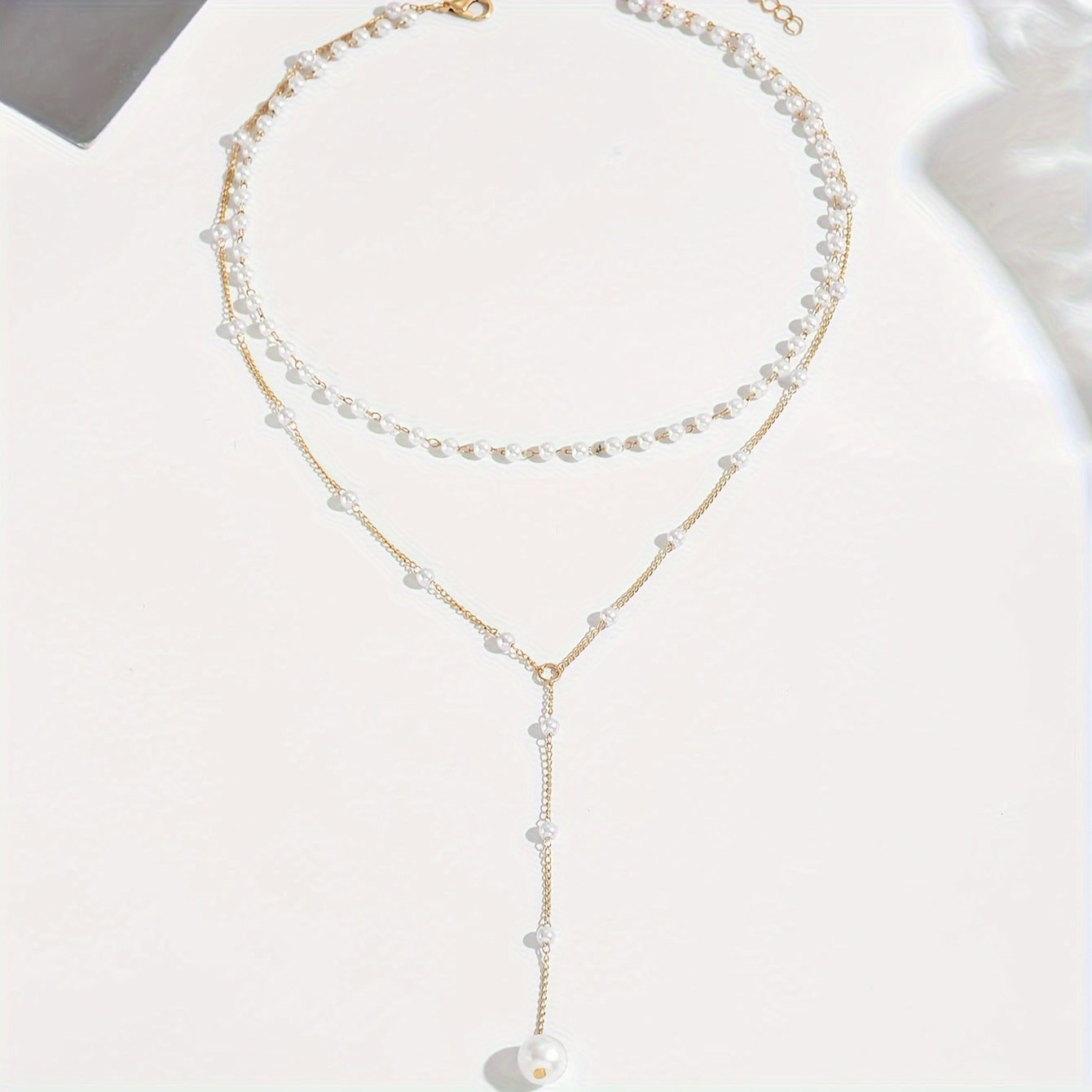 Celina | Women's elegant pearl necklace with tassels | White