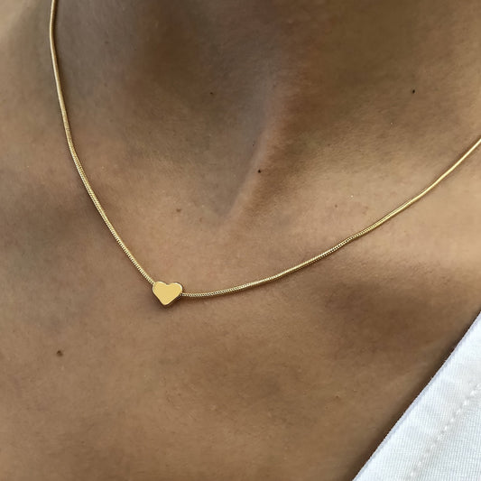 Solmira | Women's heart and star pendant necklace on snake chain | Gold
