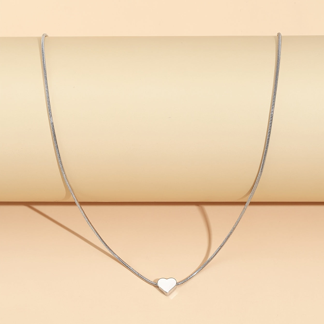 Solmira | Women's heart and star pendant necklace on snake chain | Gold