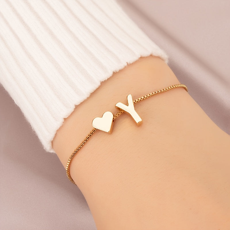 Liora | Women's minimalist heart bracelet with letter beads | Gold