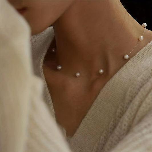Lunelle | Women's minimalist pearl necklace with invisible thread | White