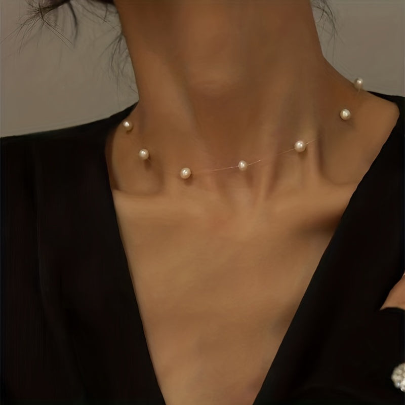 Lunelle | Women's minimalist pearl necklace with invisible thread | White