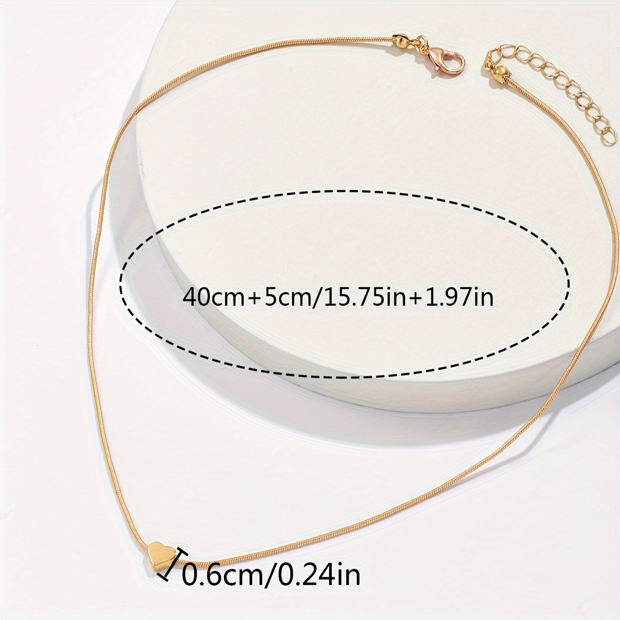 Solmira | Women's heart and star pendant necklace on snake chain | Gold
