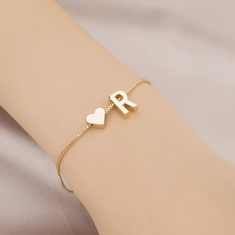 Liora | Women's minimalist heart bracelet with letter beads | Gold