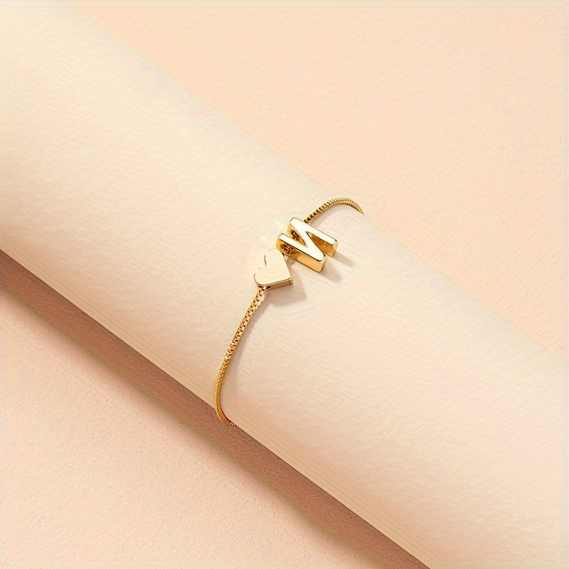 Liora | Women's minimalist heart bracelet with letter beads | Gold