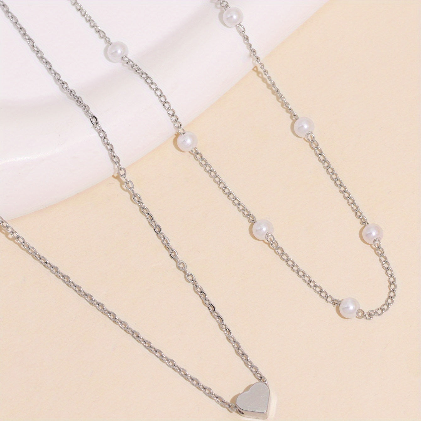Meliora | Women's delicate pearl necklace with heart pendant | Gold