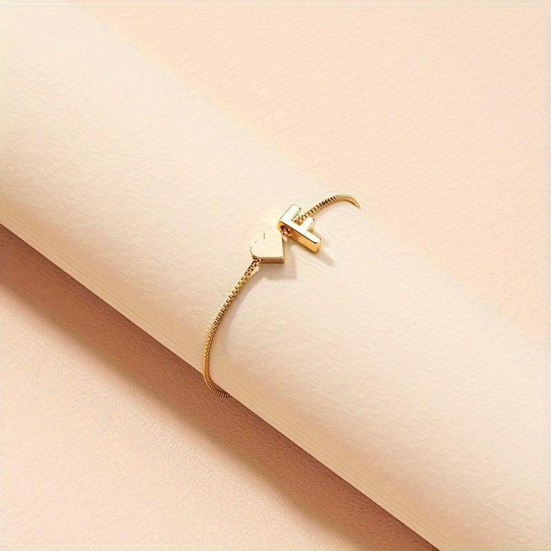 Liora | Women's minimalist heart bracelet with letter beads | Gold