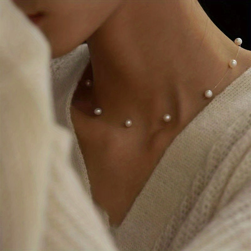 Lunelle | Women's minimalist pearl necklace with invisible thread | White