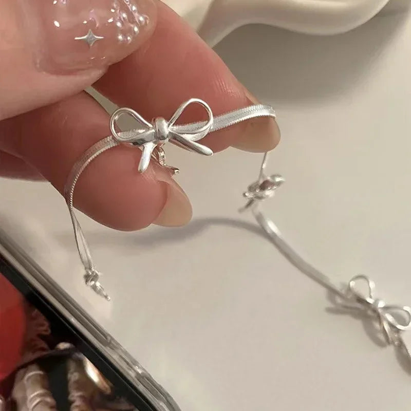 Miralyn | Women's bracelet with bow detail and elegant shine | Silver