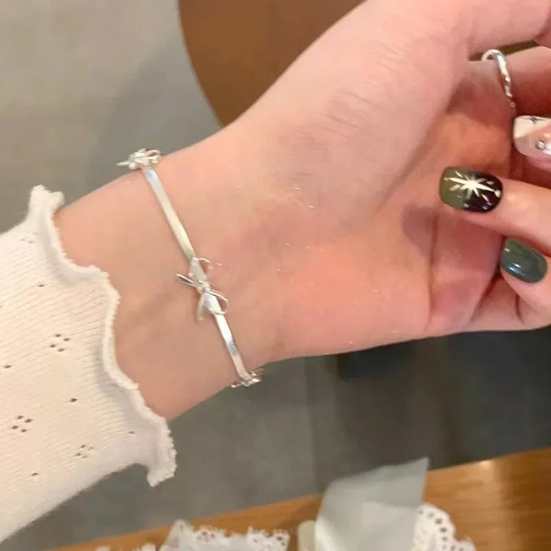 Miralyn | Women's bracelet with bow detail and elegant shine | Silver