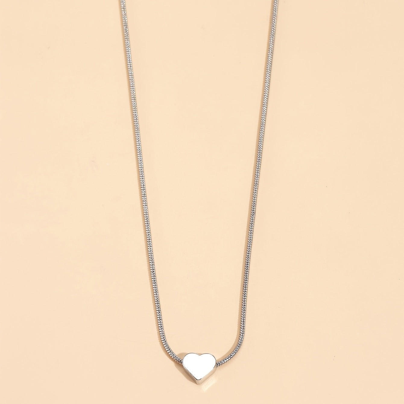 Solmira | Women's heart and star pendant necklace on snake chain | Gold
