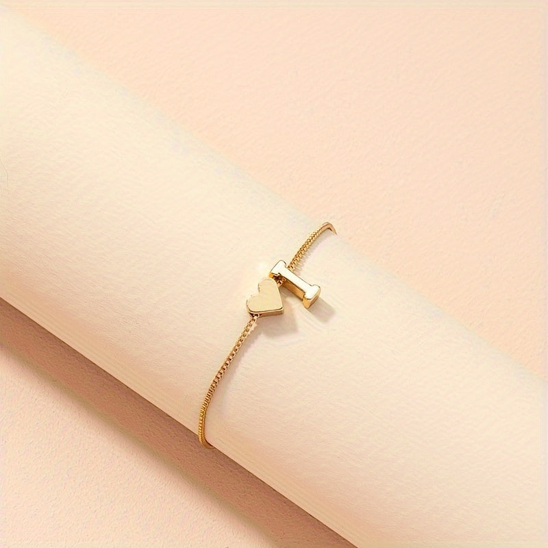 Liora | Women's minimalist heart bracelet with letter beads | Gold