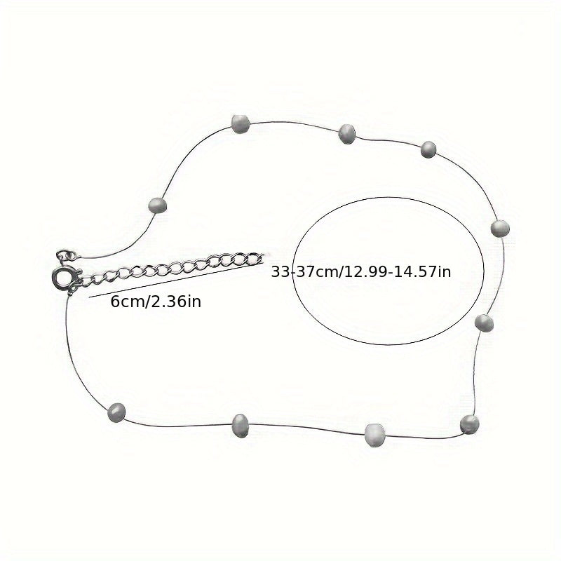Lunelle | Women's minimalist pearl necklace with invisible thread | White