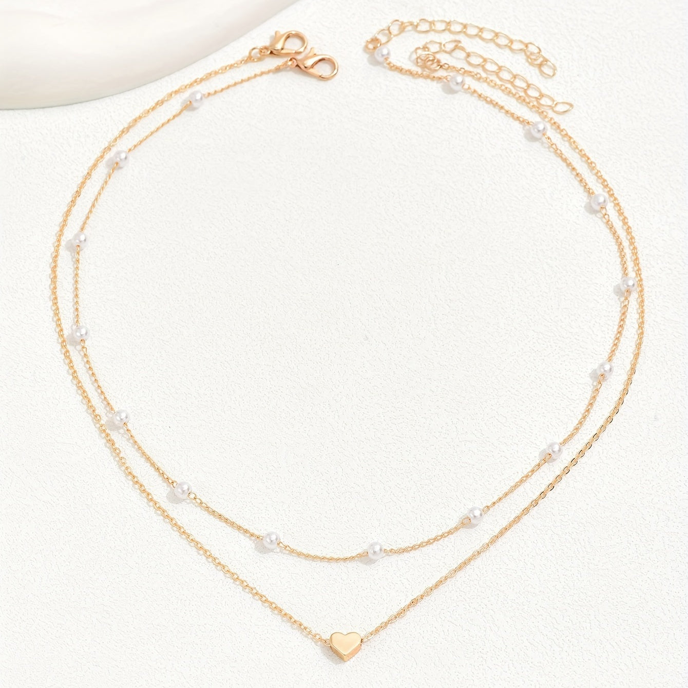Meliora | Women's delicate pearl necklace with heart pendant | Gold