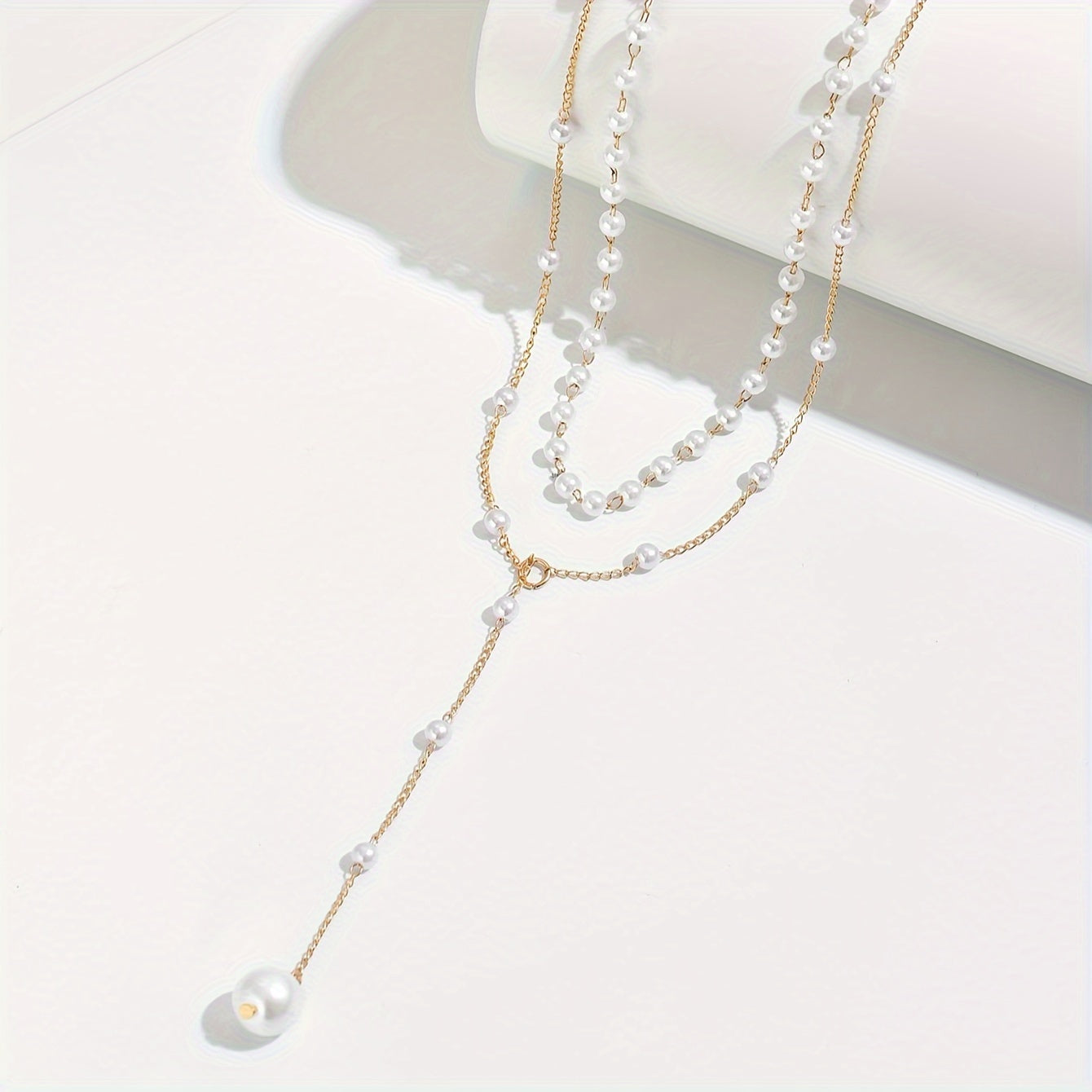 Celina | Women's elegant pearl necklace with tassels | White