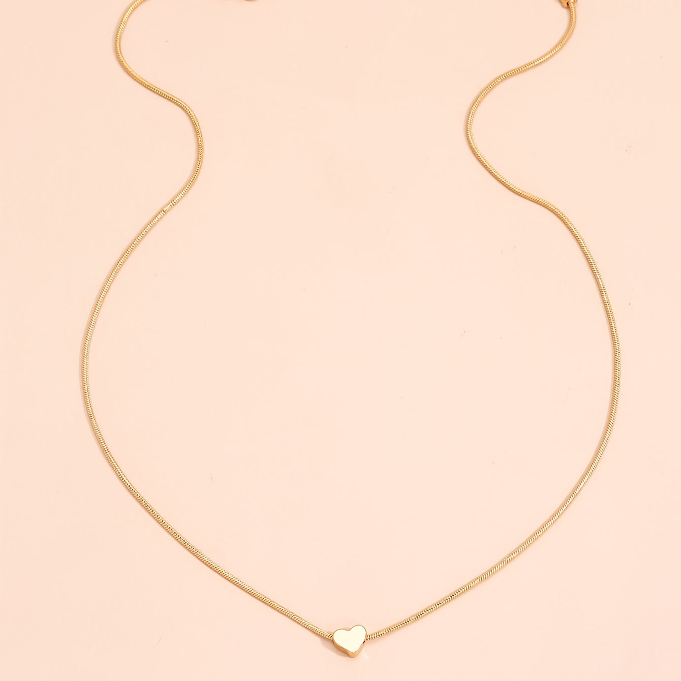 Solmira | Women's heart and star pendant necklace on snake chain | Gold