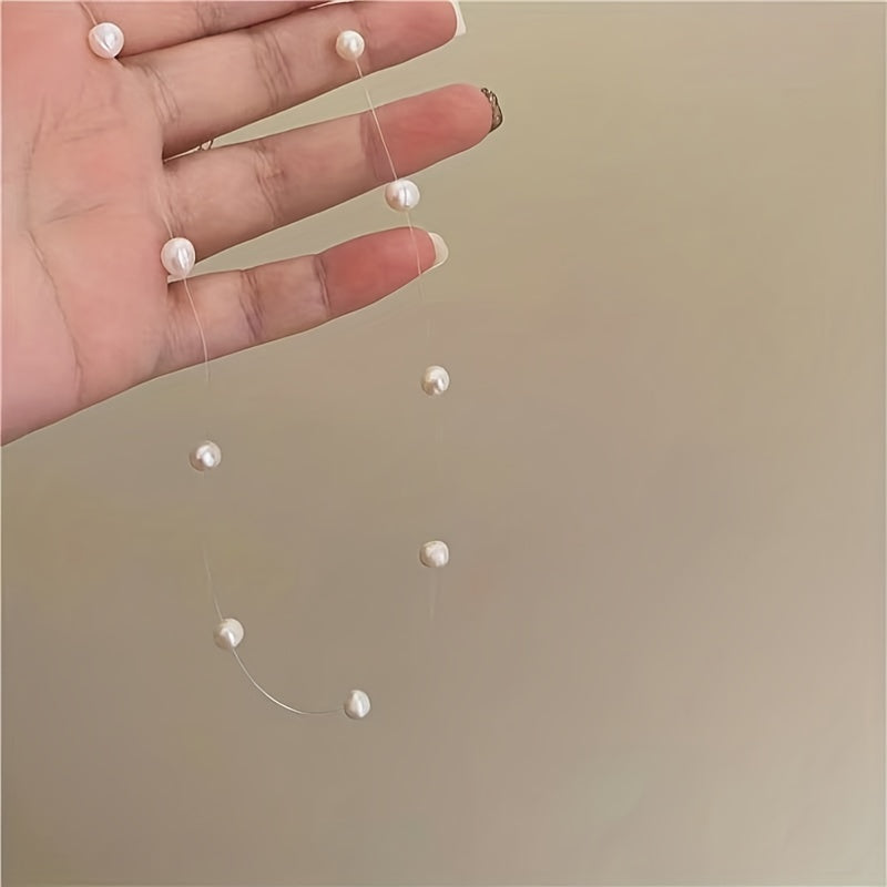 Lunelle | Women's minimalist pearl necklace with invisible thread | White